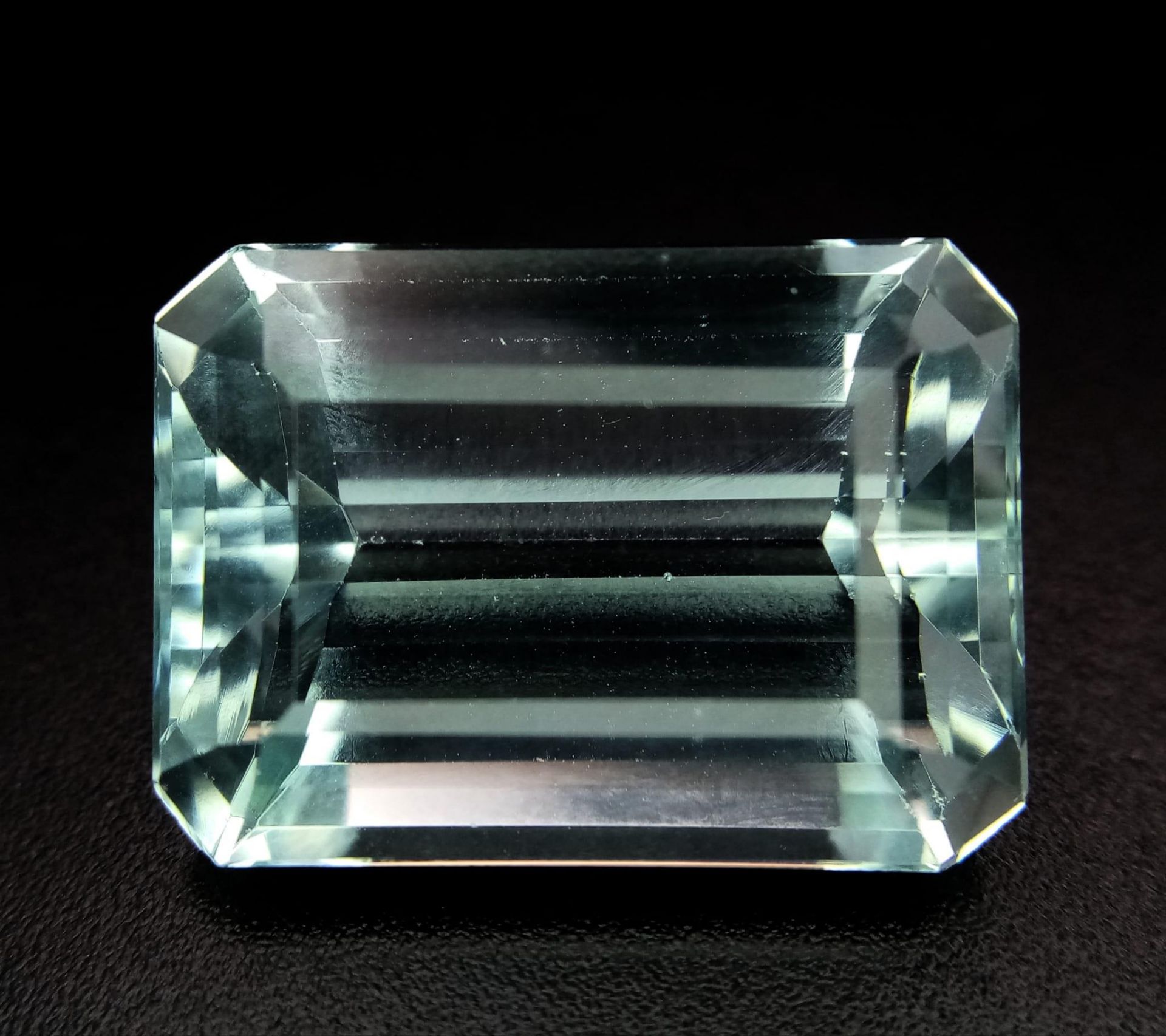 A PAIR OF NATURAL AQUAMARINE GEMSTONES, 24.72ct AND 24.92ct OCTAGONAL STEP CUT, EYE CLEAN, AND