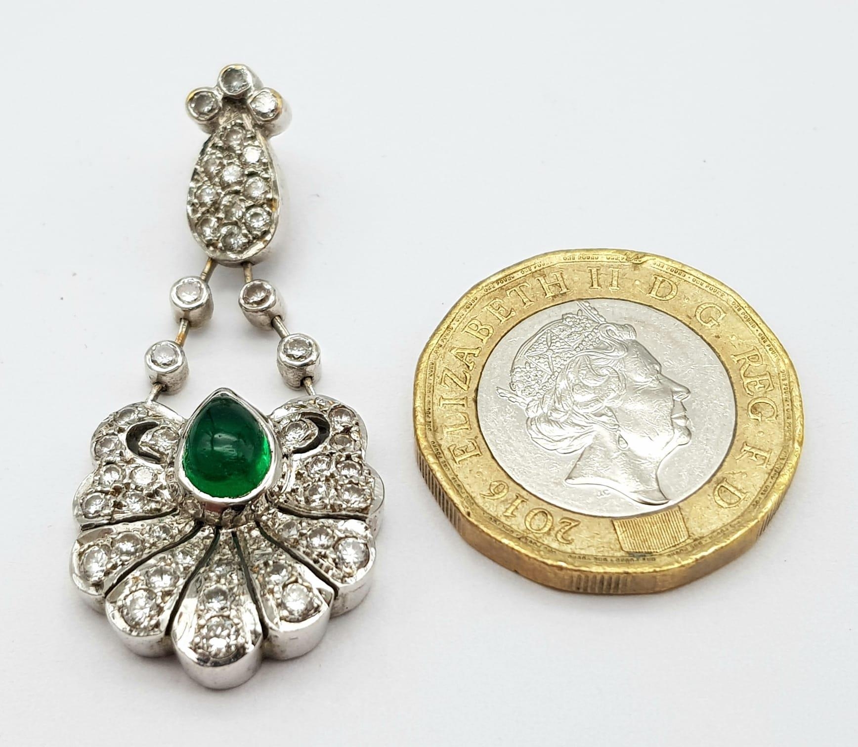 An 18K White Gold Emerald and Diamond Pendant. Central teardrop emerald with a white diamond petal - Image 4 of 4