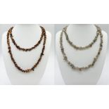 A parcel of Two Vintage Long Natural Stone Necklaces. Both measure 90cm in length. The white