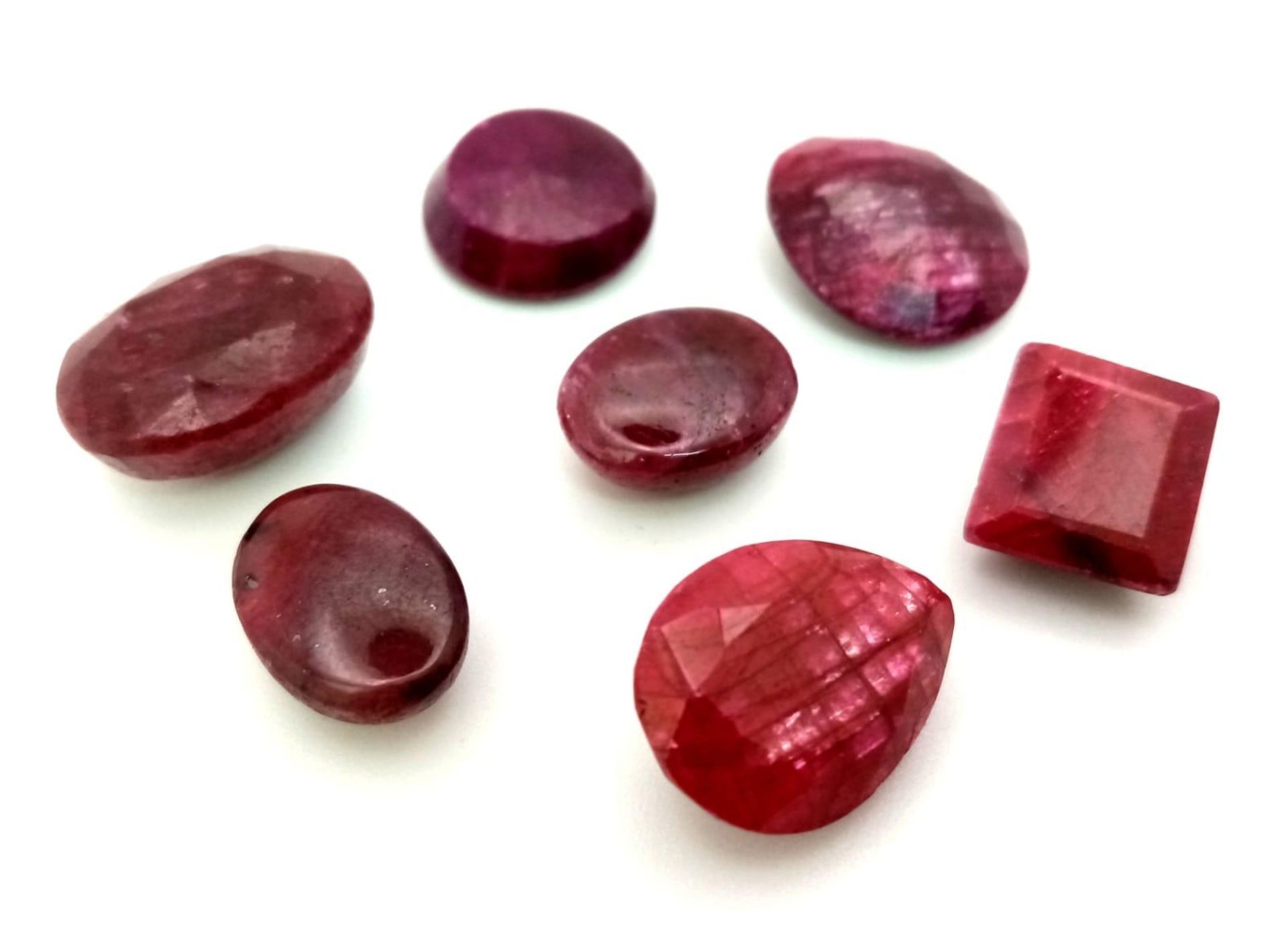 A Lot of 97.5CT Faceted & Cabochon Colour Enhanced Ruby. Mixed Shapes. GLI Certified. - Bild 2 aus 4