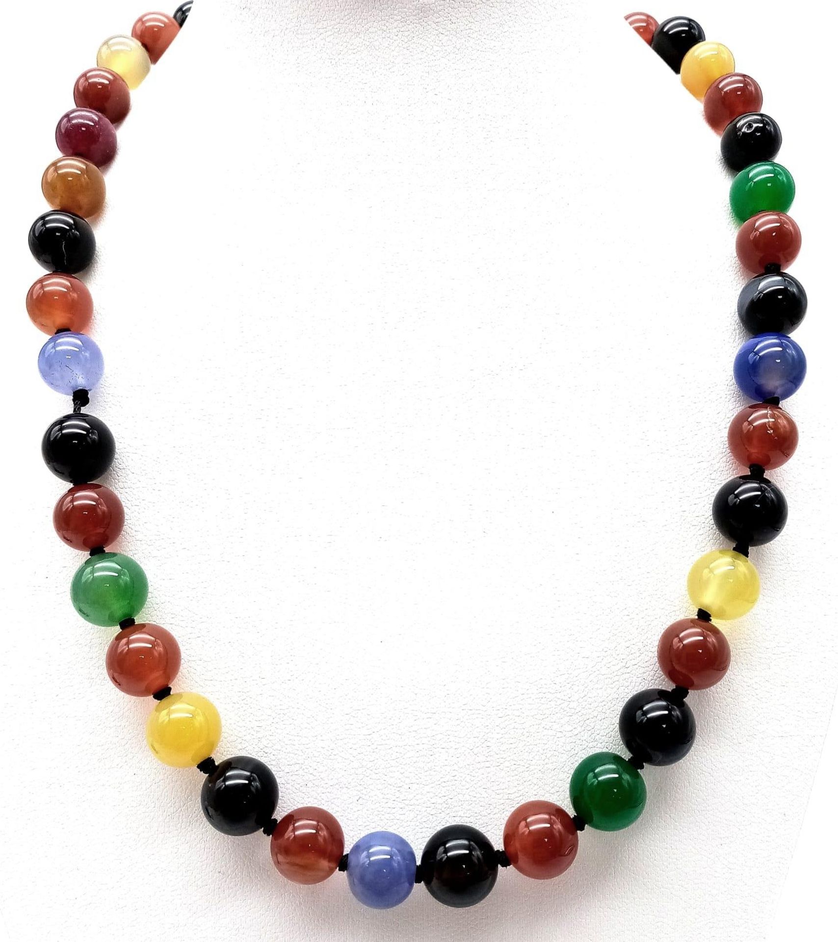 A Colourful Mixed Gemstone Bead Necklace. 42cm length. Includes jade and carnelian. 10mm beads