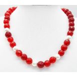 A Red Stone and Cultured Pearl Necklace with 925 Silver Clasp. 36cm.