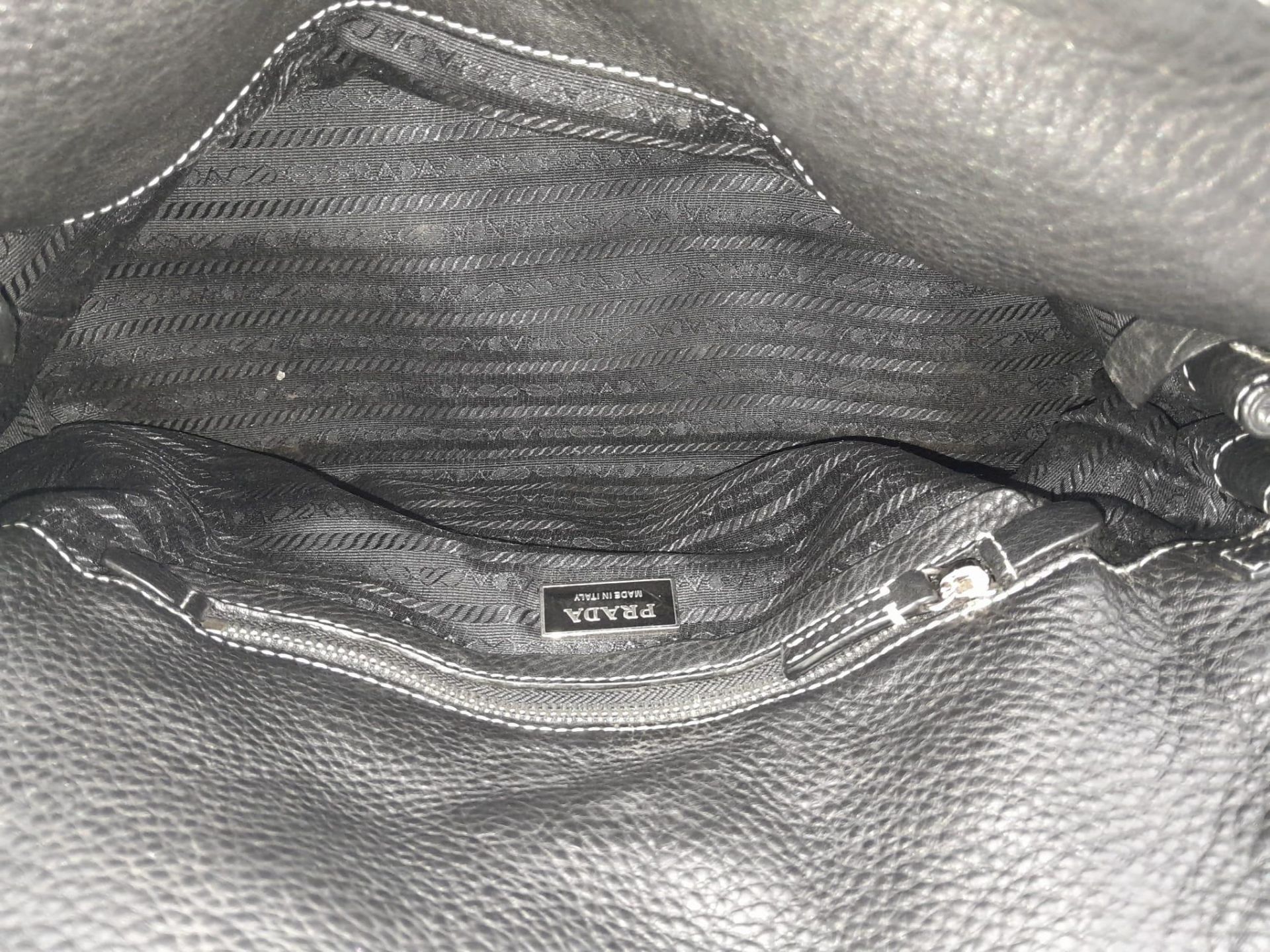 A Prada Black Vitello Shoulder Bag. Leather exterior with silver-toned hardware, two straps, push - Bild 12 aus 16
