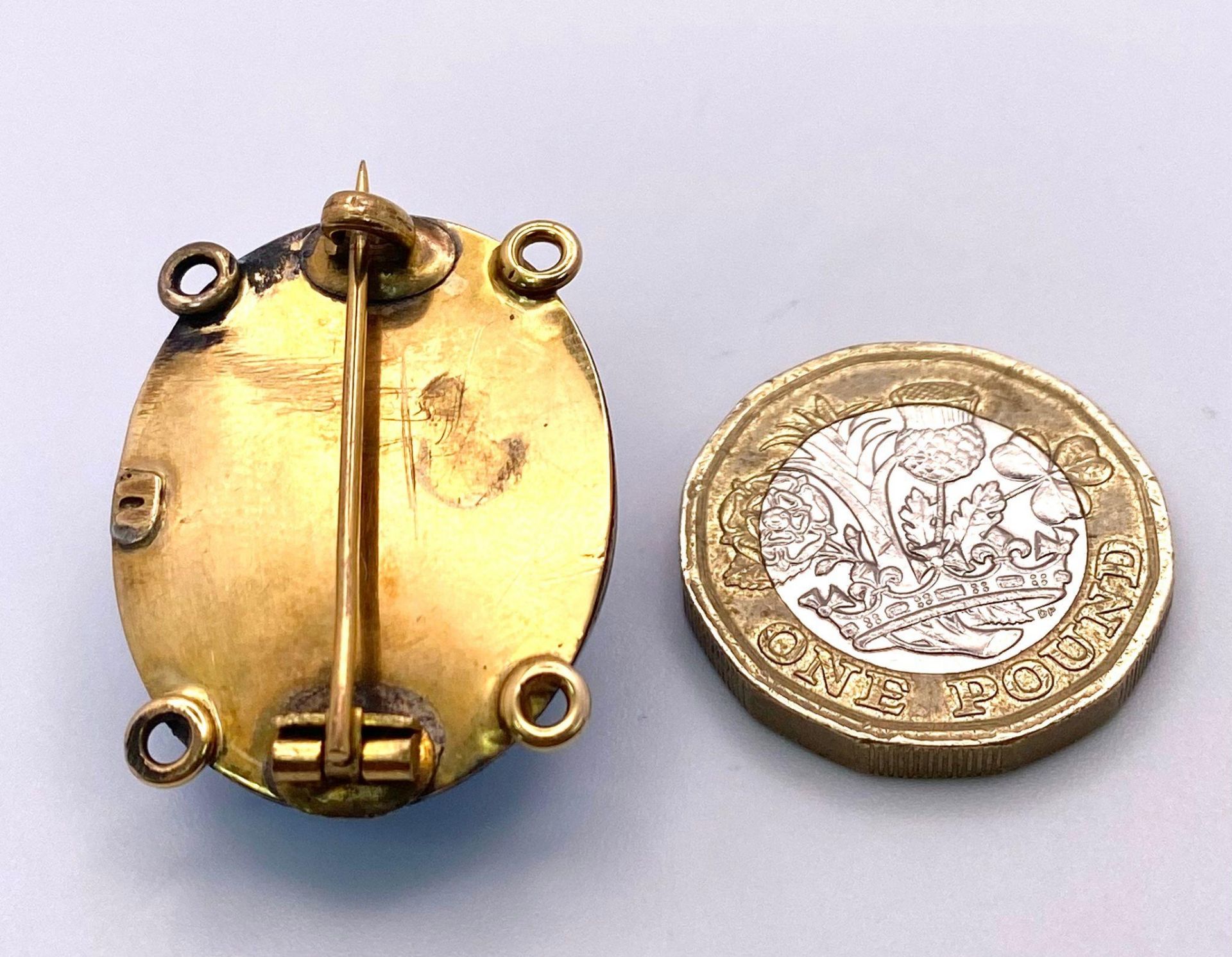 A Victorian Blue Enamel, Pearl and Mid-Karat Gold Remembrance Brooch. Domed blue enamel with a - Image 3 of 3