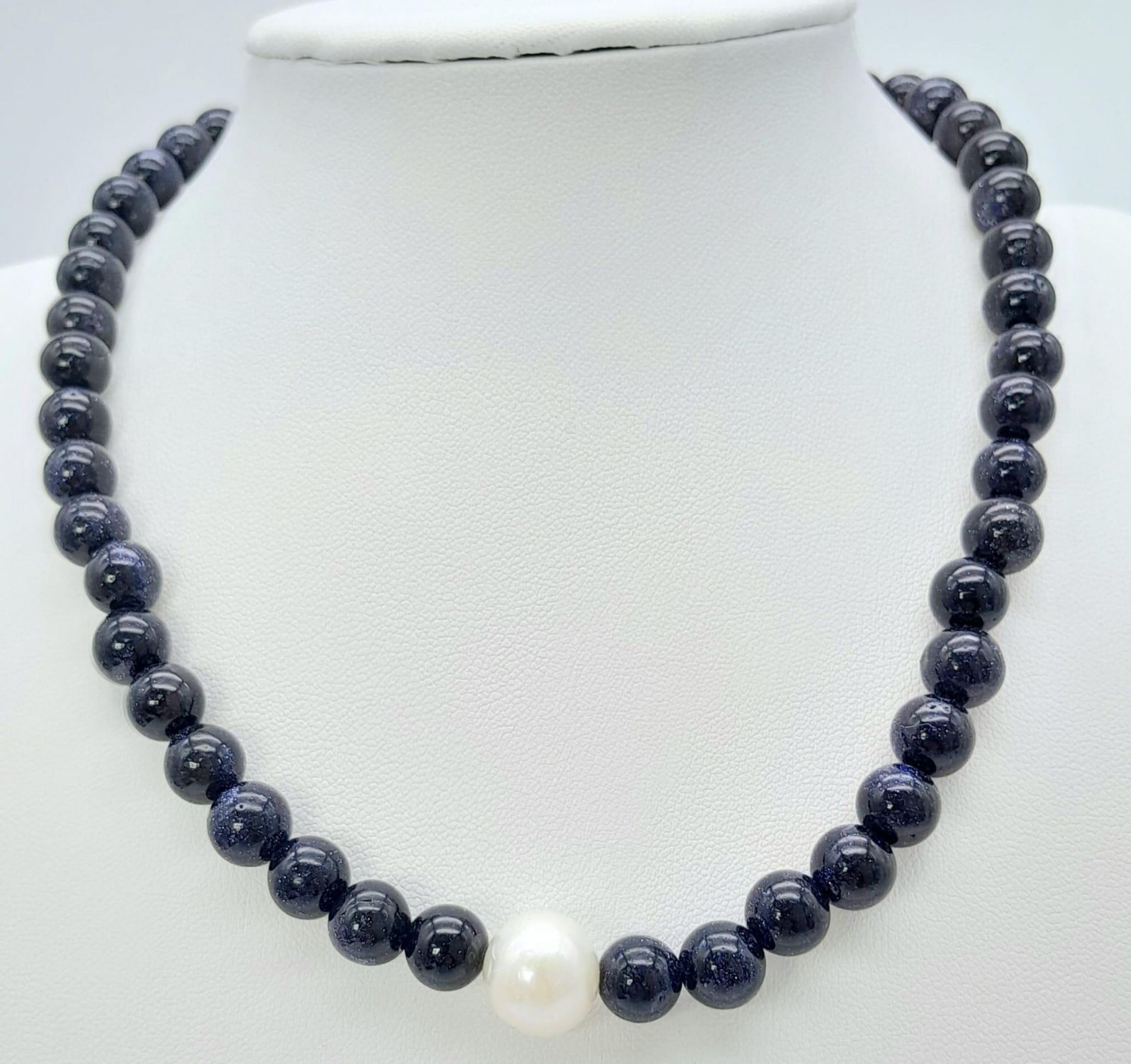 A Sandstone and Cultured Pearl Necklace. 40cm