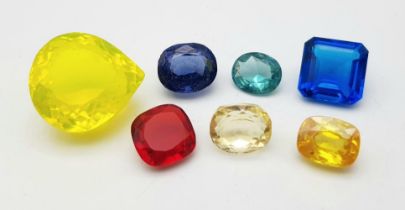 A Mixed 98ctw Gemstone Lot - Natural (heat treated) and synthetic mix. No certificates so as found.