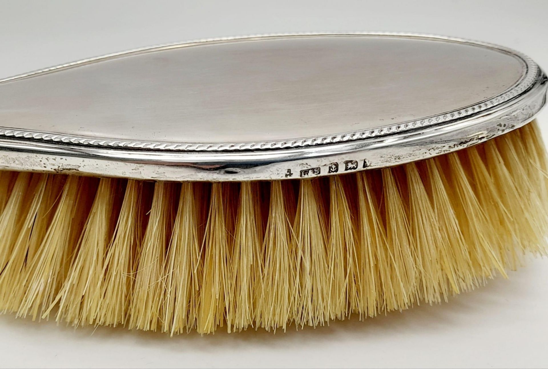 An Antique Sterling Silver Hair, Clothes Brush and Comb Set. Hallmarks for Birmingham 1919. Makers - Image 5 of 12