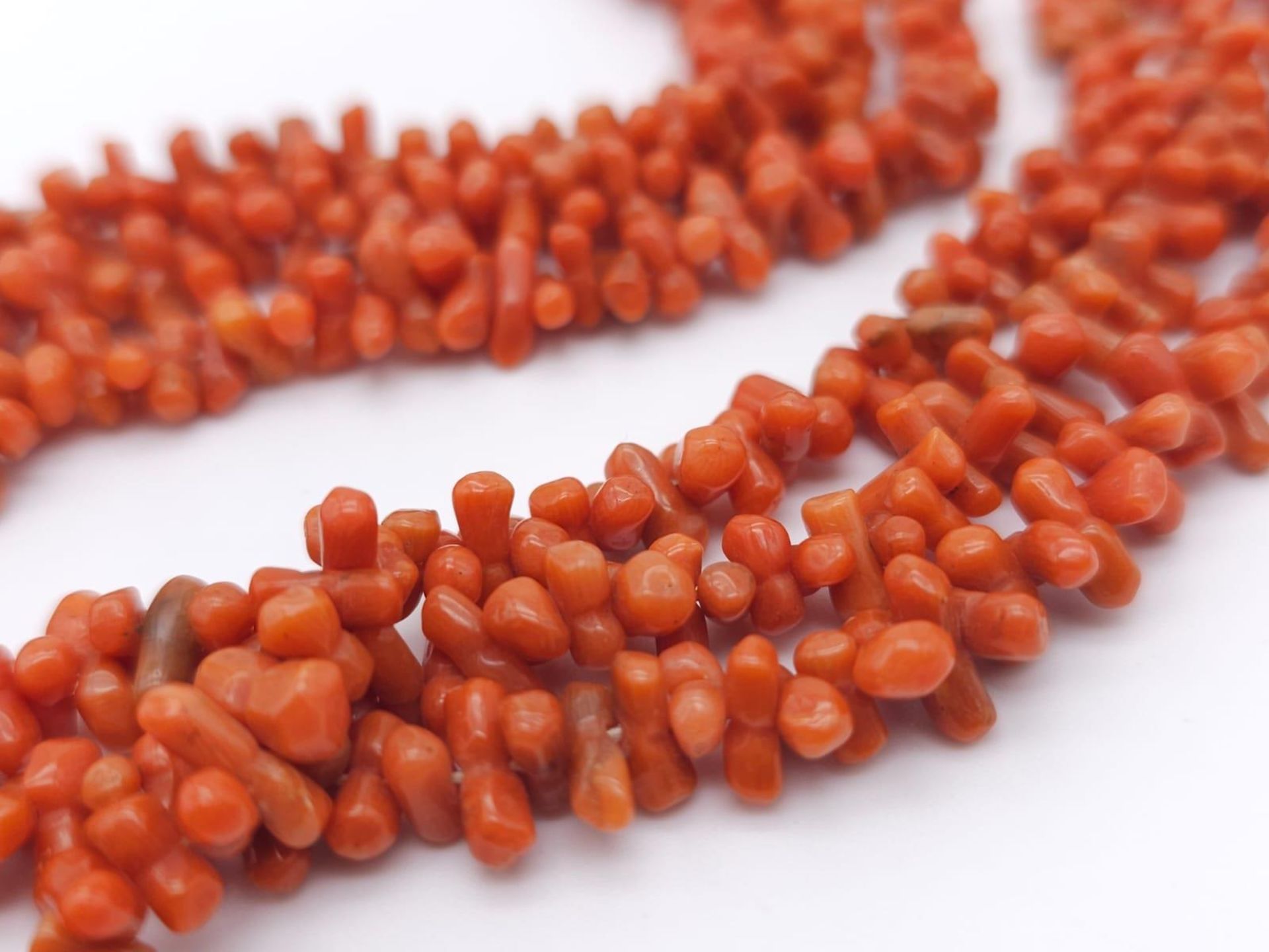 Three Strand Orange Coral Necklace. Measuring 42cm in length, this bold necklace is a bright - Image 2 of 5