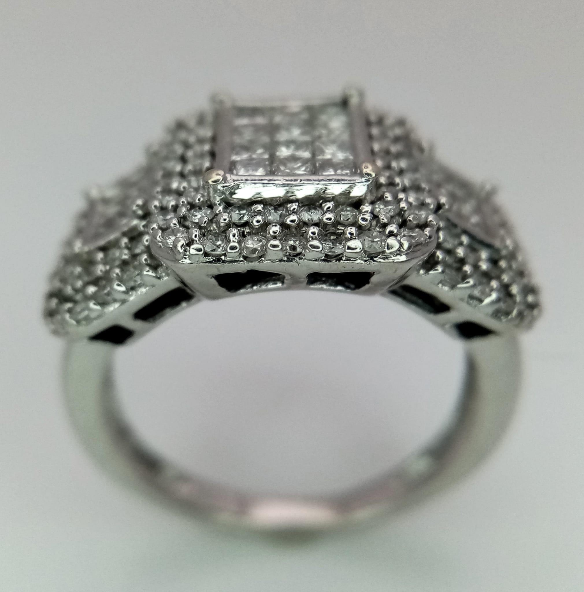 An Art Deco Style 18K White Gold and Diamond Ring. A belt-buckle design of round and princess cut - Image 5 of 7