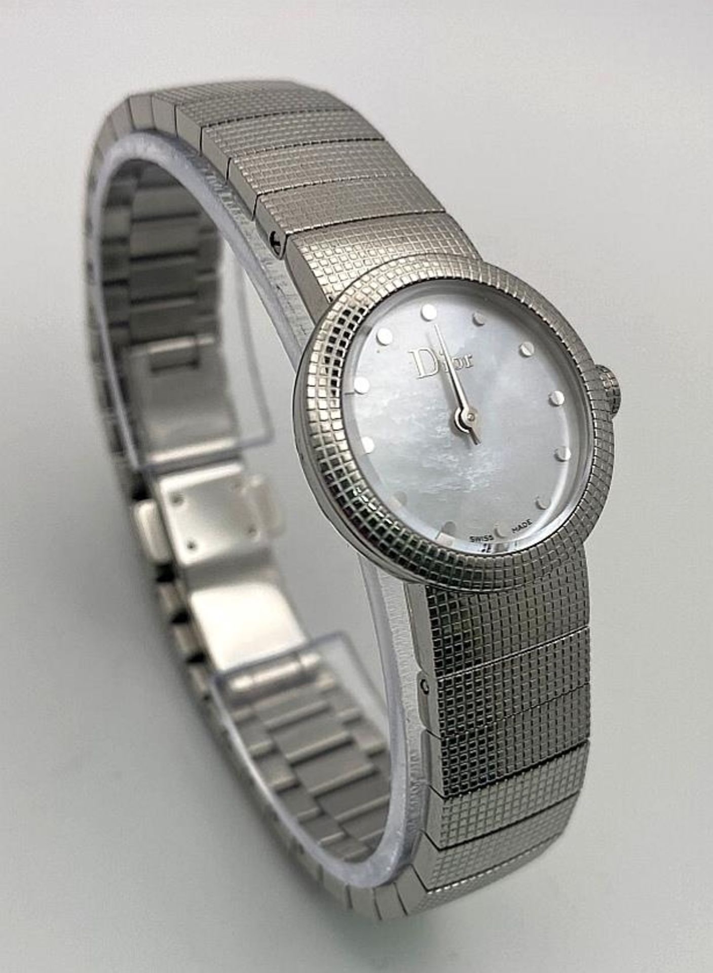 A Designer Christian Dior Quartz Ladies Watch. Stainless steel bracelet and case - 23mm. White dial.