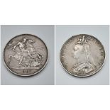 An 1887 Queen Victoria Silver Crown Coin. VF grade but please see photos.