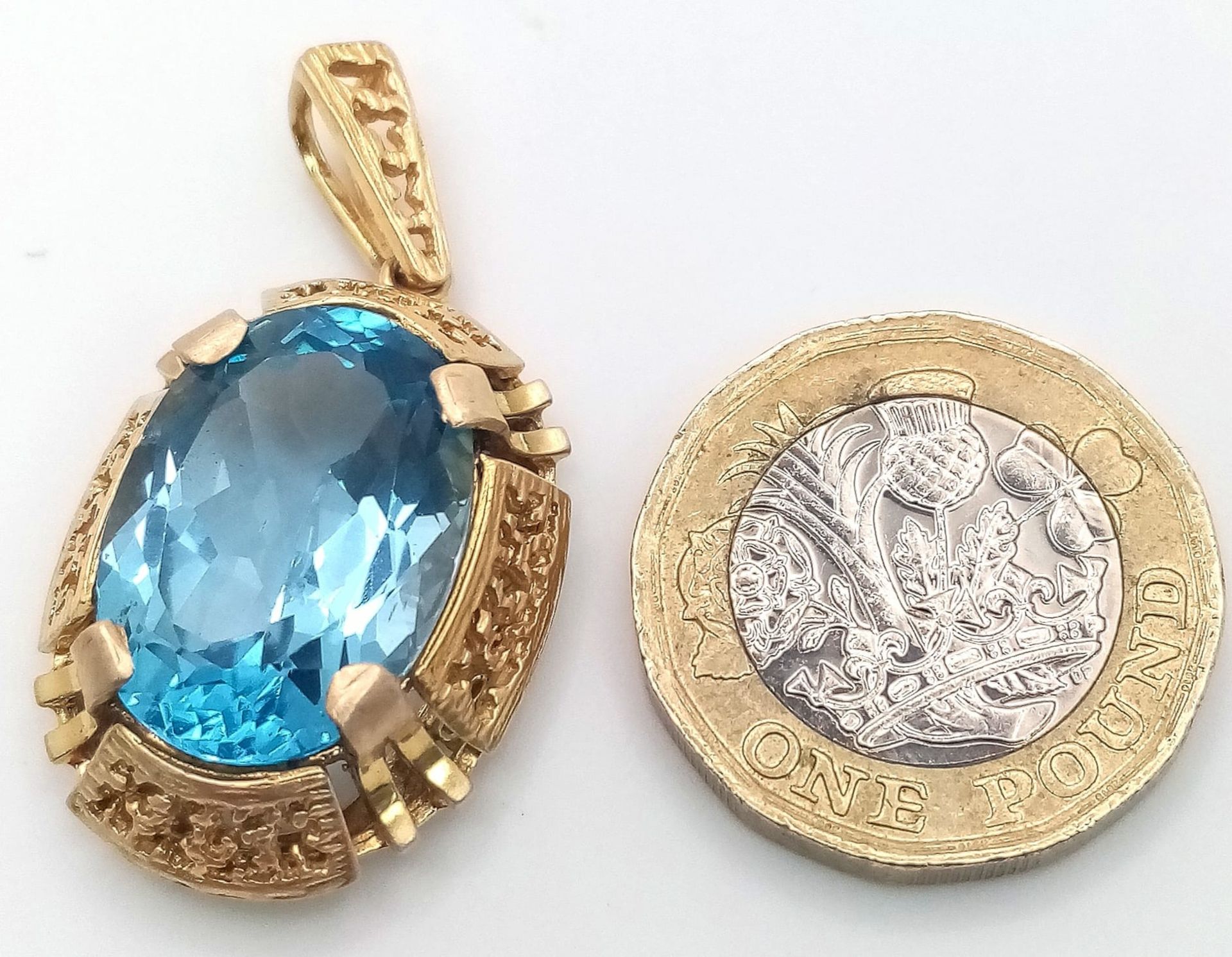 A 12ct Aquamarine and 9K Yellow Gold Pendant. 4cm. 7.75g total weight. - Image 2 of 4