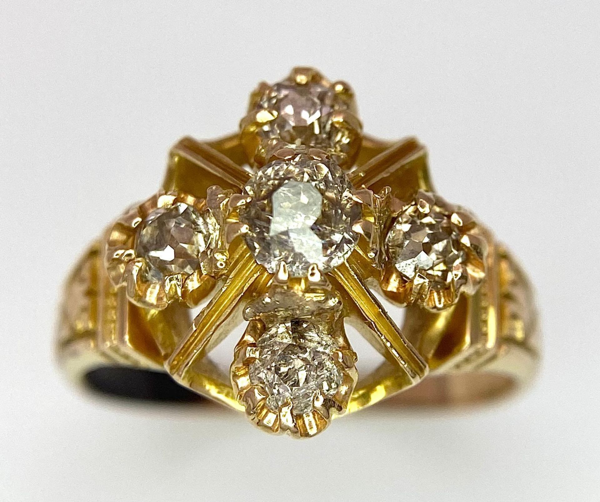 A 9K Yellow Gold (tested) Diamond Ring. Five round cut diamonds on a raised setting. Size N. 4.32g - Image 2 of 5