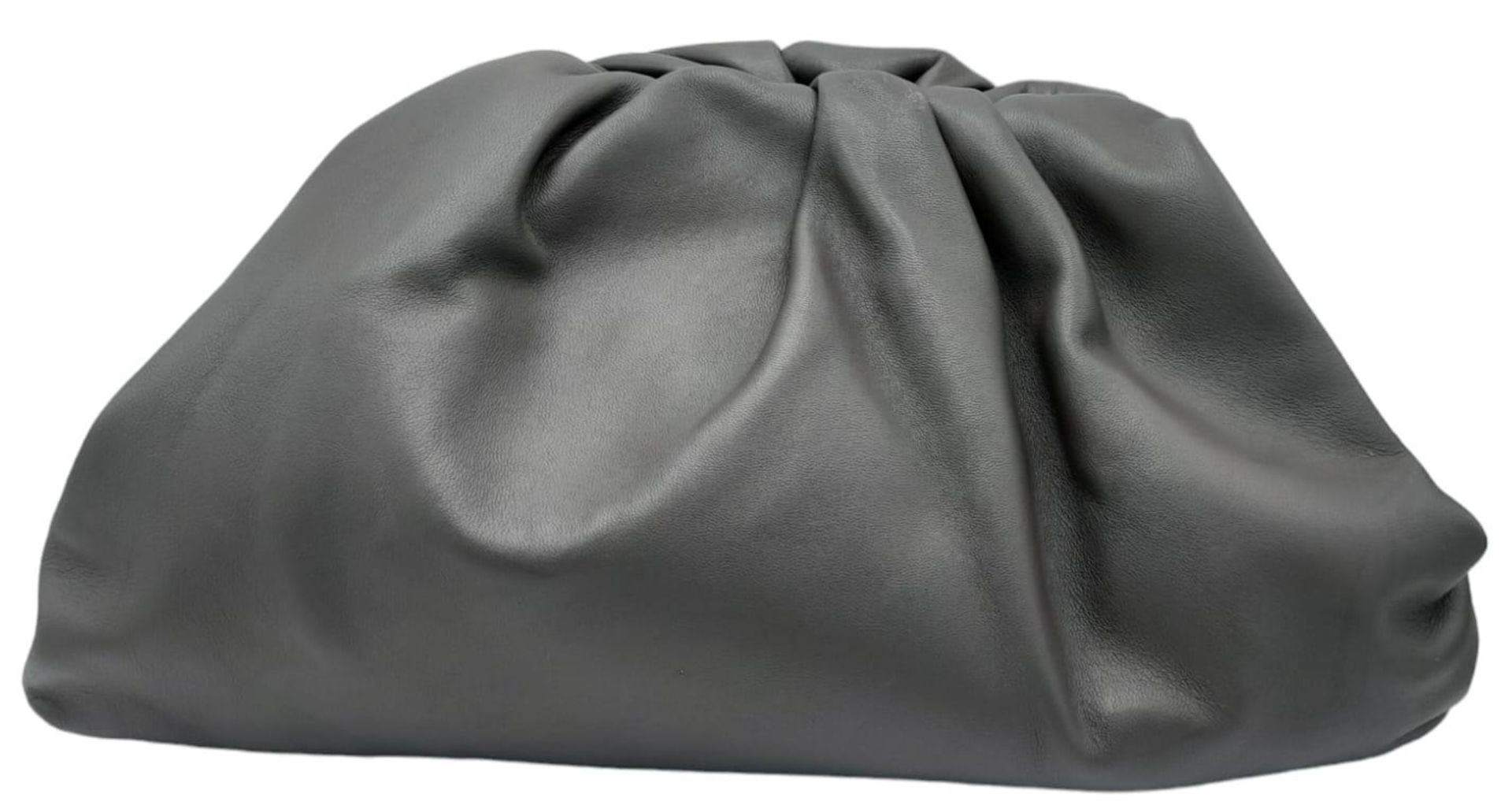 A Bottega Veneta Charcoal Pouch Clutch Bag. Soft leather exterior with magnetic top closure and a