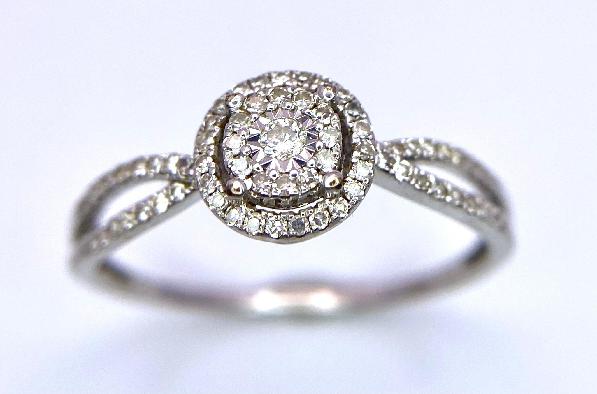 A 9K White Gold Diamond Double Halo Ring. Central diamond with double diamond halo and shoulder - Image 2 of 4