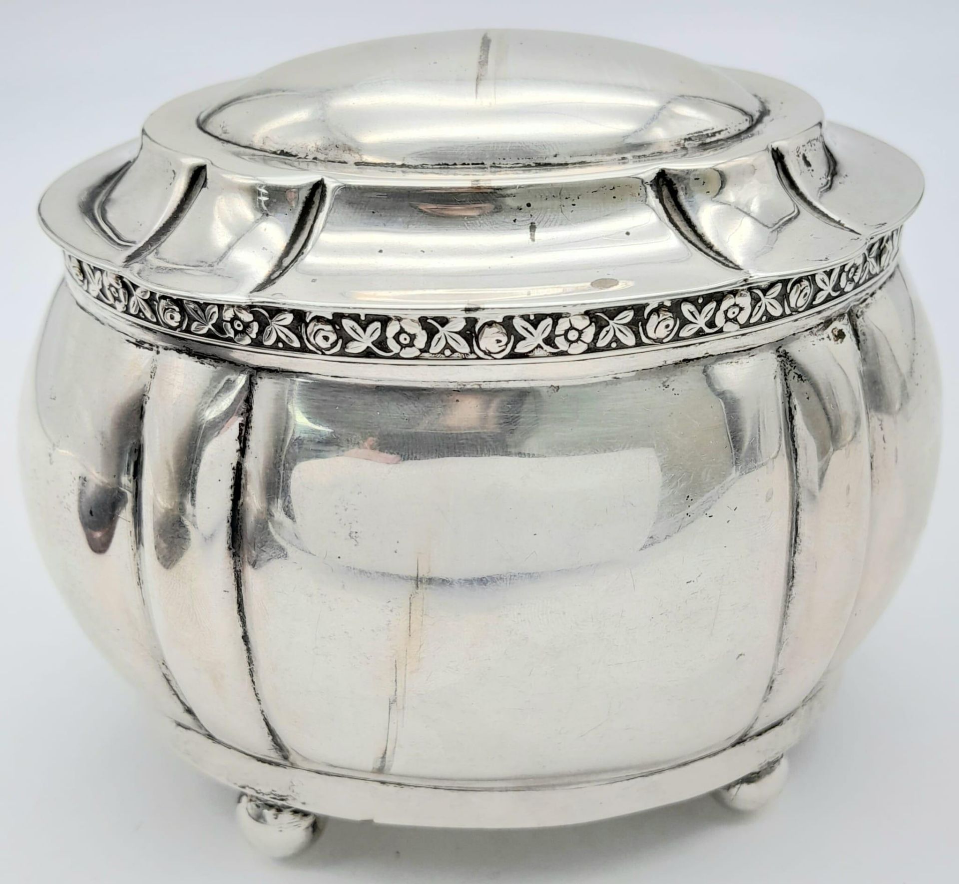 An Antique Austro-Hungarian Empire Silver Lidded Bowl. Decorative rim, four pedestal-ball feet.