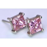 Pair of Pink Stone Stud Earrings. One backing missing.