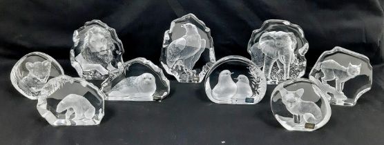 A Collection of Nine Vintage Carved Glass Animal Figures. To include: Lion, Polar Bear, Lynx, Lion