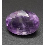 A 7.44ct Amethyst Loose Gemstone in Oval shape. Brazil Origin. GFCO Swiss Certified.