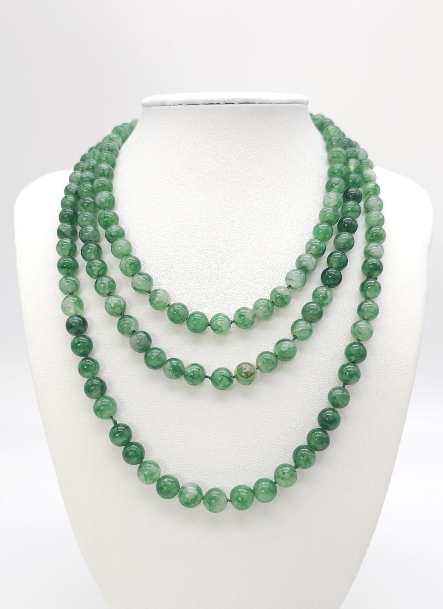 Long Beaded Jade Necklace. Lovely white and green colours coming through each rounded Jade stone - Image 4 of 7