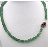 A 210ctw Emerald Rondelle Gemstone Necklace with Ruby Clasp - Set in 925 Silver. 44cm length. Ref: