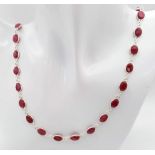 A Ruby Gemstone Long Chain Necklace set in 925 Silver. 56cm length. 22.5g total weight. Ref: CD-1233