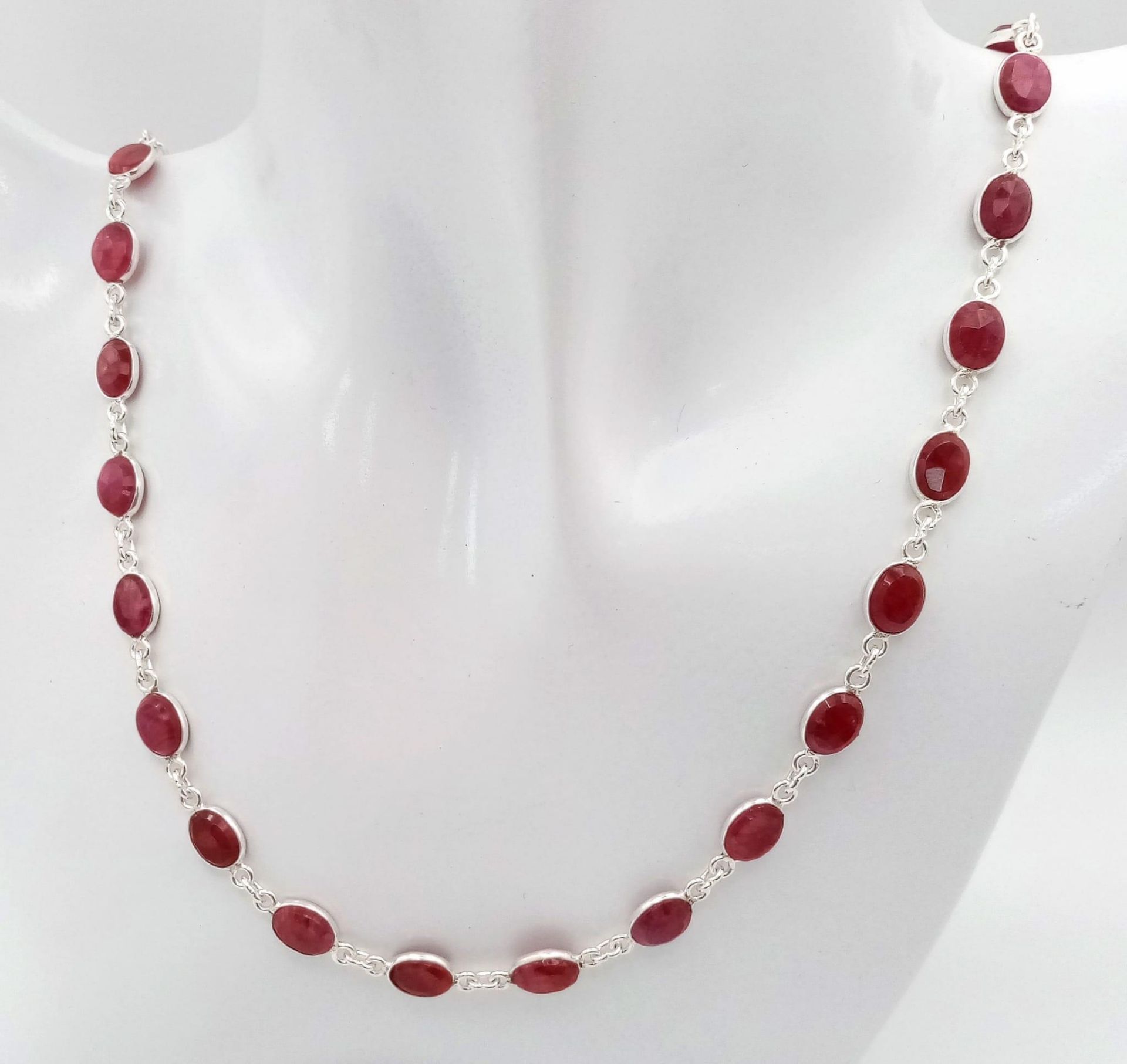 A Ruby Gemstone Long Chain Necklace set in 925 Silver. 56cm length. 22.5g total weight. Ref: CD-1233