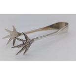An antique sterling silver Eagle claw sugar tongs. Full hallmarks Birmingham, 1937. Total weight
