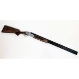 A Deactivated Kirici 12 Gauge Over and Under Shotgun. 76cm barrel length. 121 cm total length.