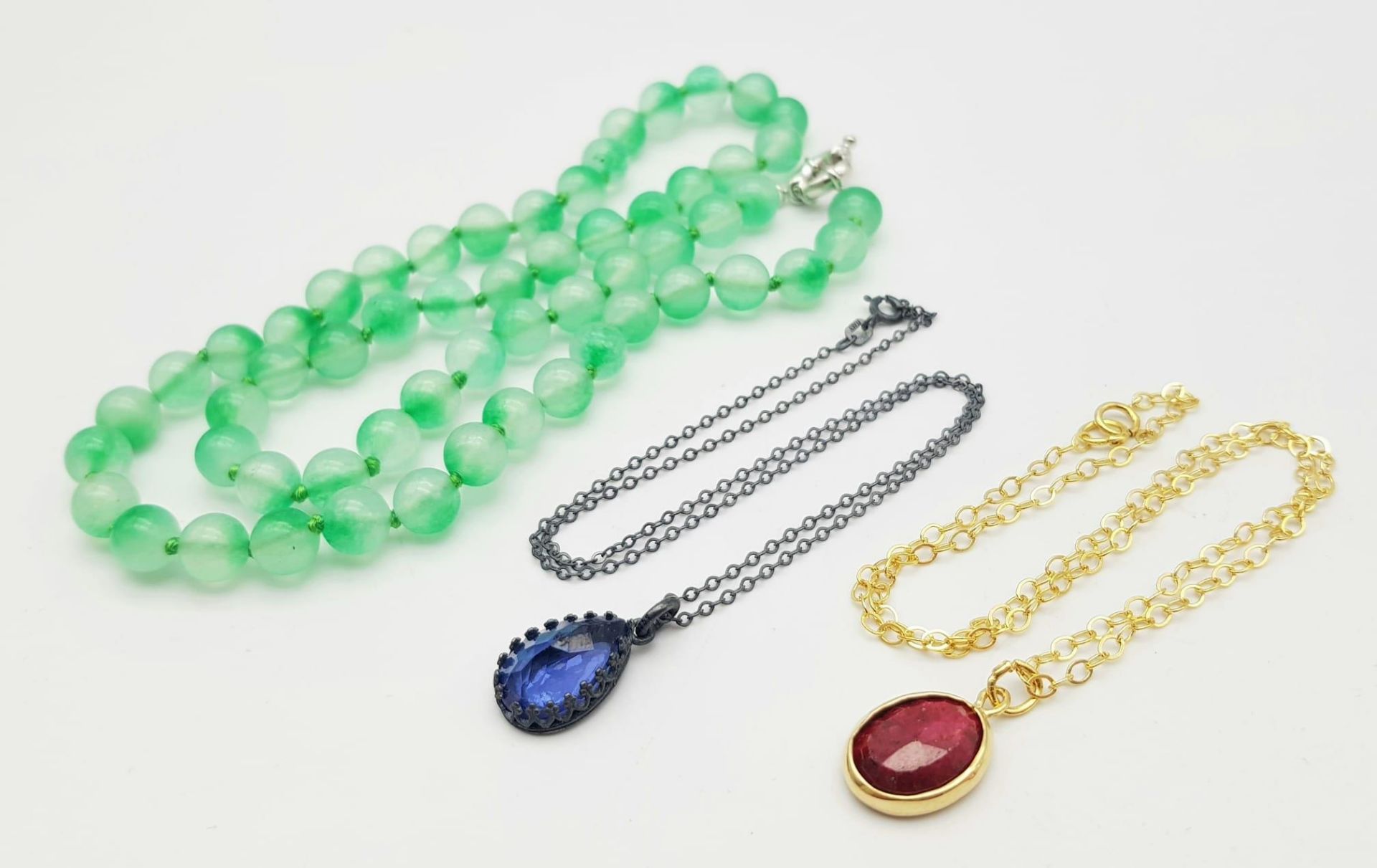 Three Different Style Necklaces - green aventurine, silver with blue stone pendant, gold plated