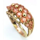 A 9K GOLD DRESS RING WITH UNUSUAL COLOURED STONES SET . 4.9gms size P