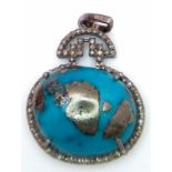 A Turquoise Cabochon and Diamond Pendant set in 925 Silver. Beautiful large cabochon with a