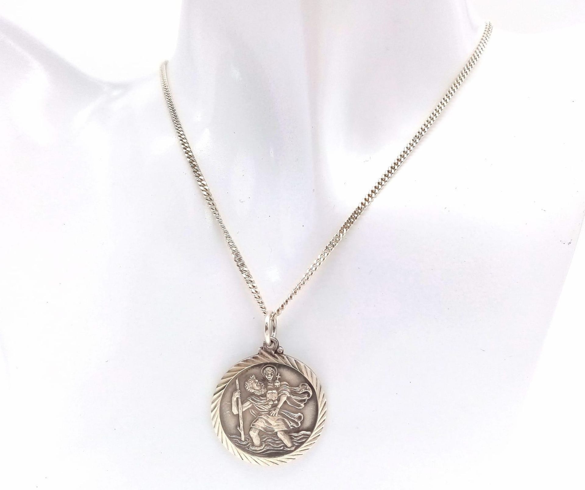 A Silver Georg Jensen St. Christopher Pendant Necklace. Stamped on Obverse Side. 2.6cm Diameter on a