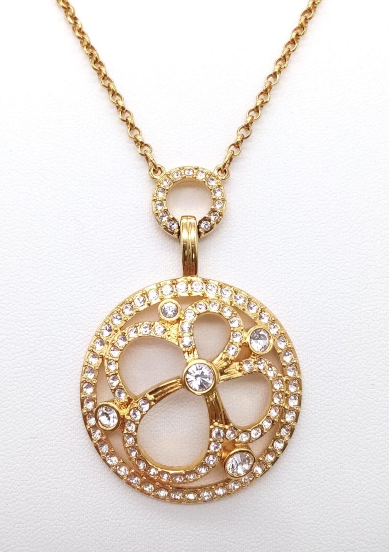 A Swarovski Gilded Necklace and Pendant with White Stone Decoration. - Image 2 of 8
