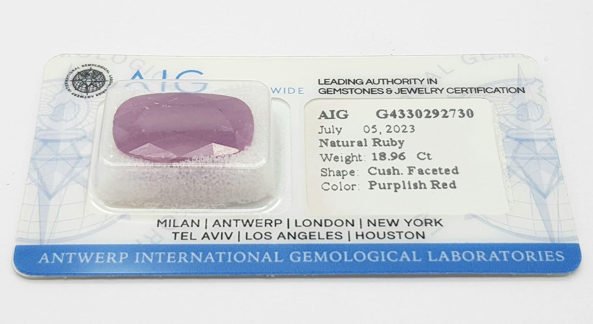 A Sealed 18.9ct Natural Rare Ruby, in the Cushion Faceted Shape. Comes with the AIG Milan - Image 3 of 9