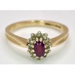 A Vintage 9K Yellow Gold Diamond and Ruby Ring. Central oval diamond with diamond surround. Size