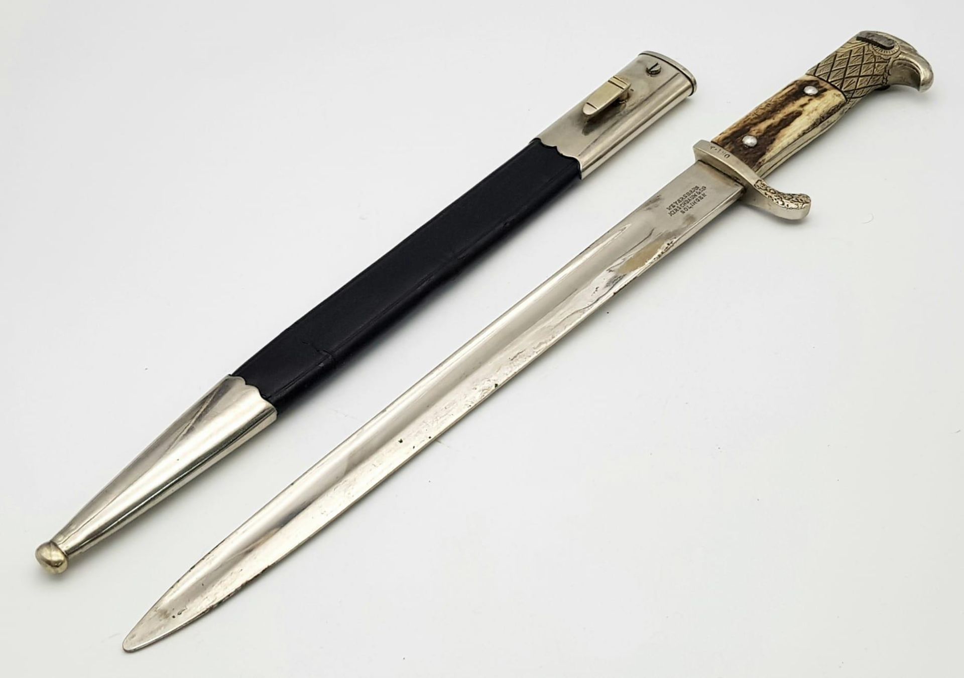 A German Nazi Police Bayonet with a Polished Steel Blade. Makers mark of Weyersberg, Kirschbaum &