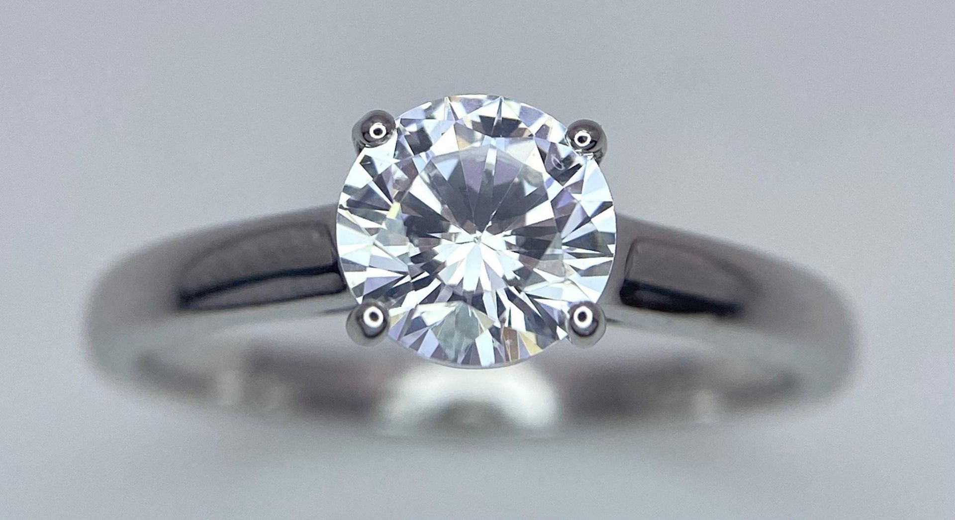 A sterling silver solitaire ring with a round cut cubic zirconium. Size: N, weight: 2 g. - Bild 2 aus 16