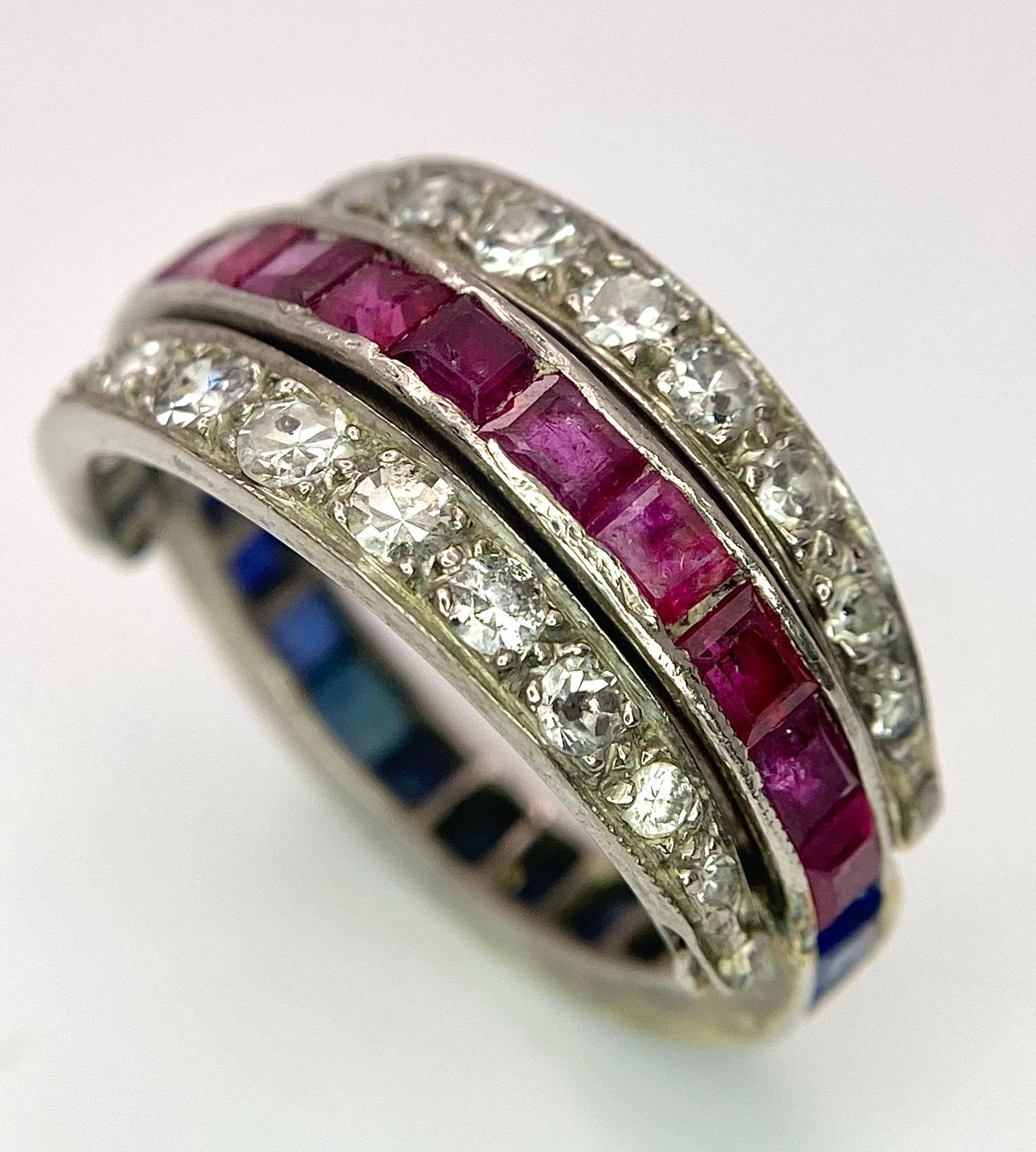 An 9k White Gold Sapphire, Diamond and Ruby Flip-Over Ring. A central band of rubies and sapphires - Image 2 of 4
