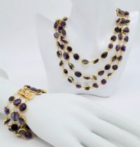 A very attractive three row gilded amethyst necklace and bracelet. Necklace length: 44-52 cm,