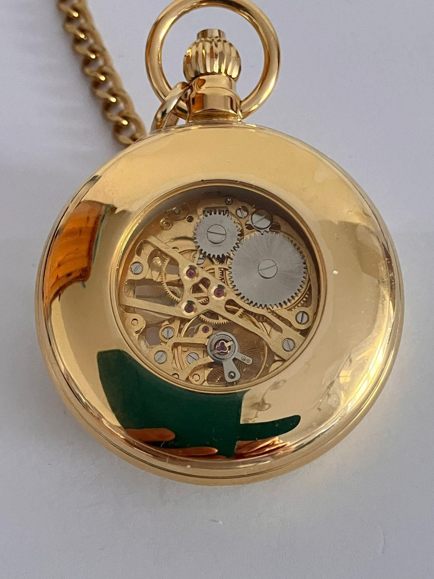 A WOODFORD SKELETON HALF HUNTER POCKET WATCH. Gold Plated finish with Skeleton Front and back. - Bild 4 aus 5