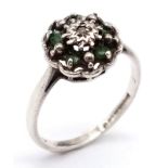 A vintage 14K white gold Emerald and Diamond floral cluster ring. Come with full Birmingham