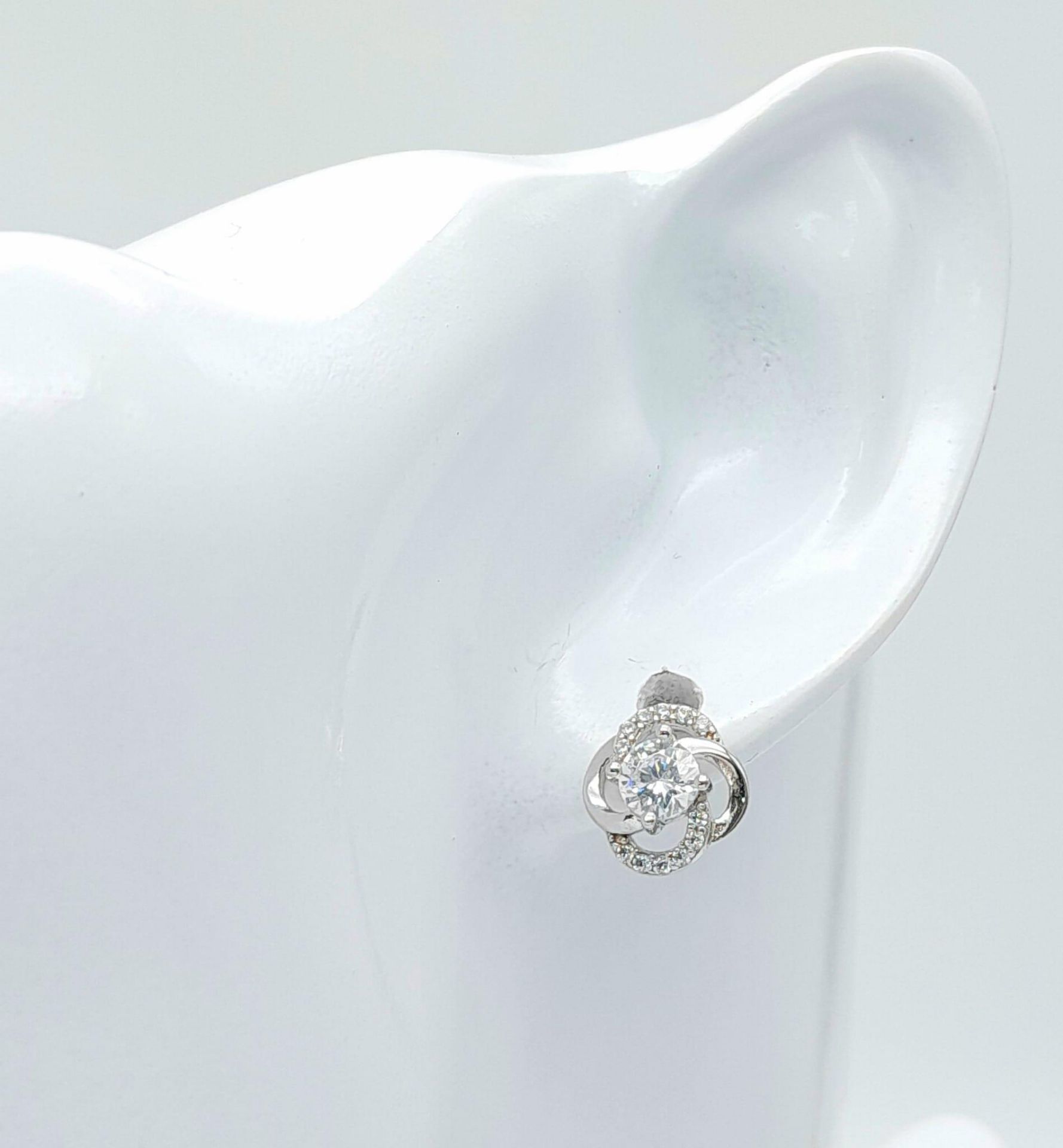 A fancy pair of 925 silver CZ earrings. Total weight 2.25G. - Image 4 of 9