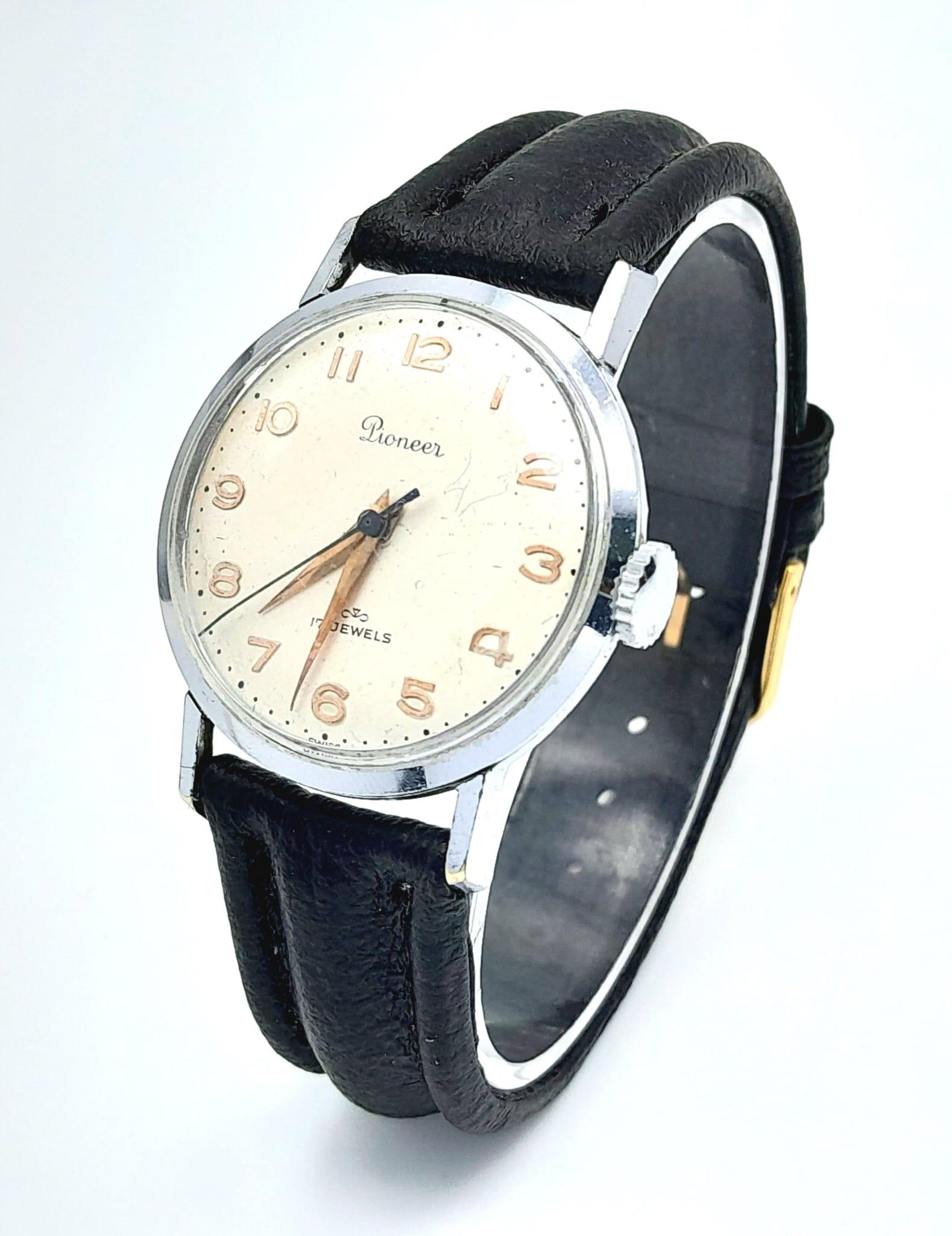 A Vintage Pioneer Mechanical 17 Jewels Gents Watch. Black leather strap. Stainless steel case -