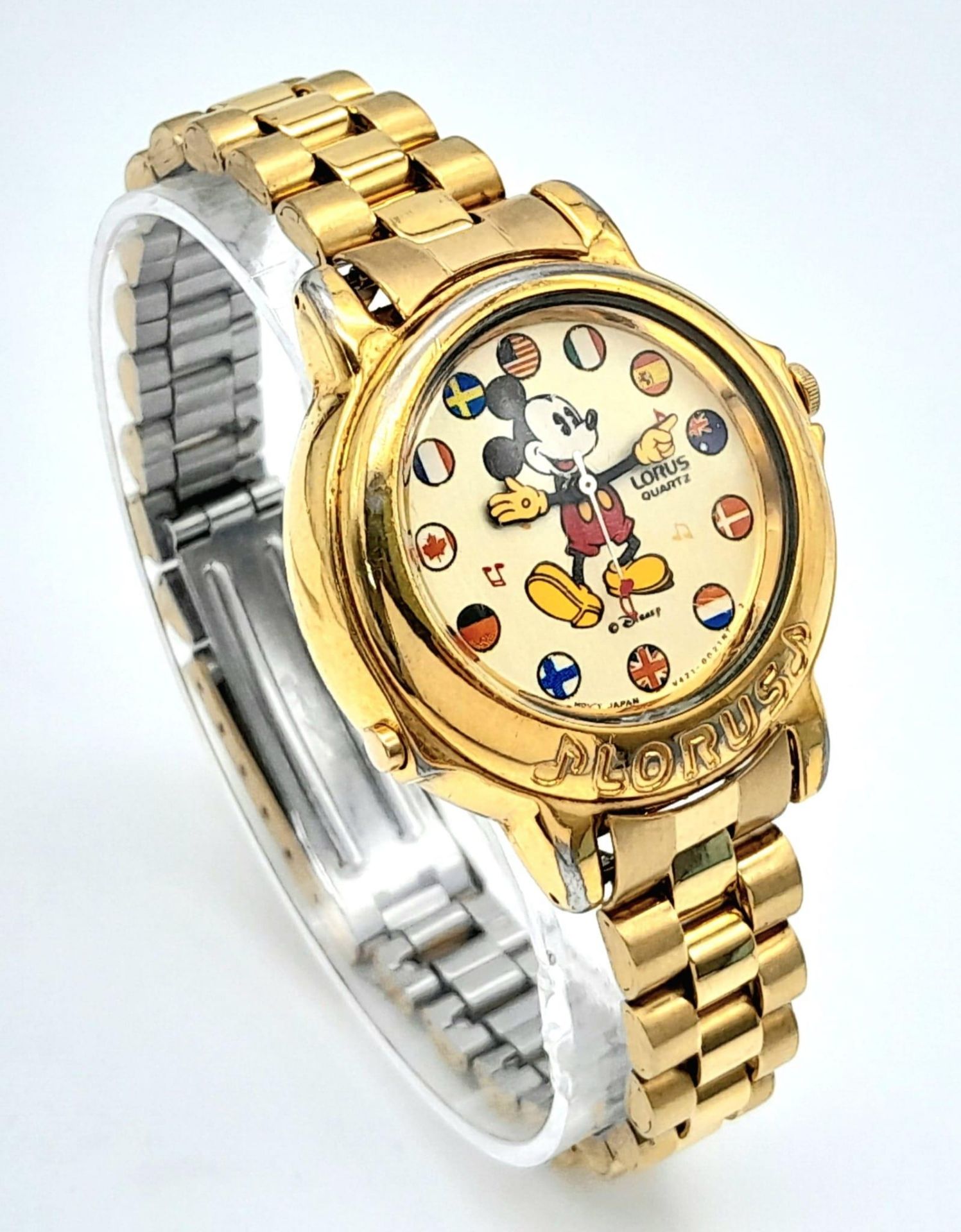 A Lorus Mickey Mouse Musical Quartz Watch. Gilded stainless steel bracelet and case - 34mm. MM - Bild 3 aus 7