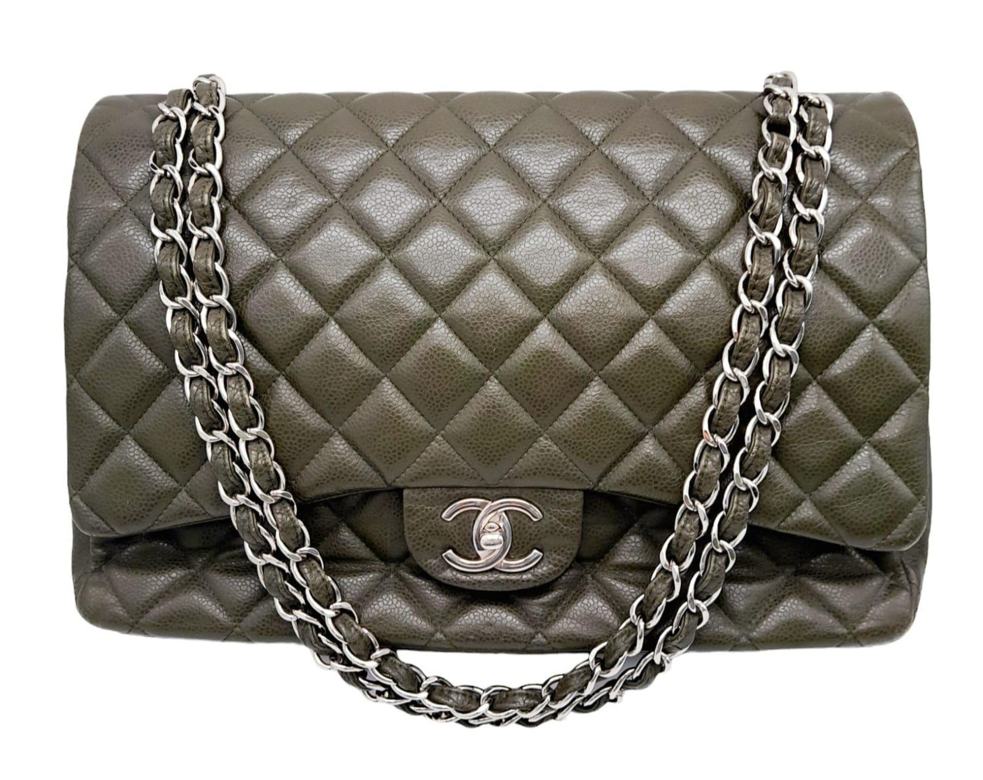 A Chanel Green Jumbo Classic Double Flap Bag. Quilted leather exterior with silver-toned hardware,
