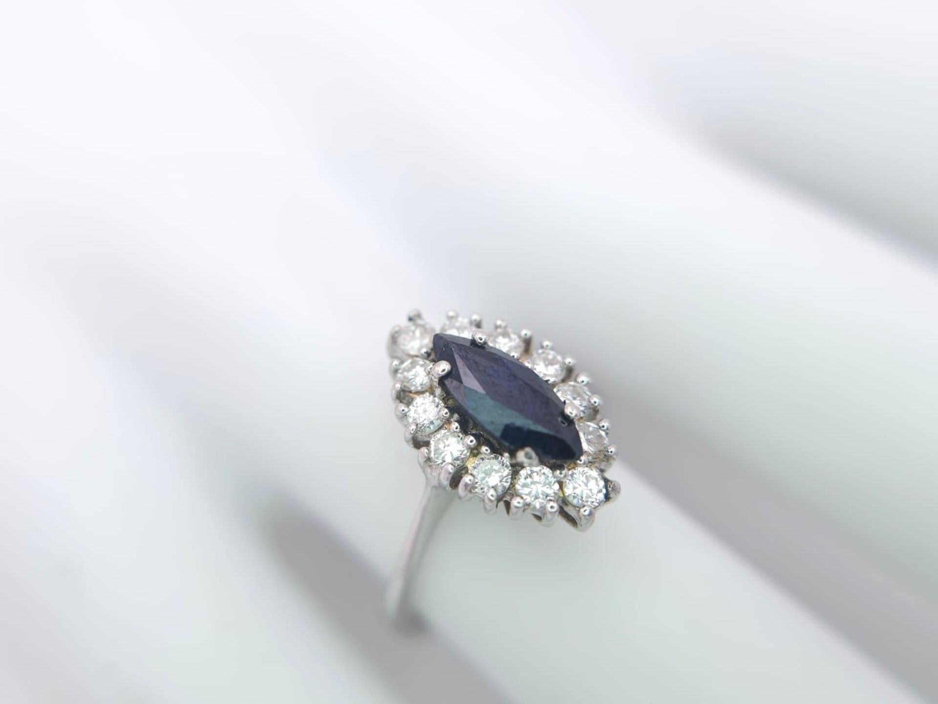 AN 18K WHITE GOLD DIAMOND & SAPPHIRE MARQUISE SHAPE RING. 0.40CTW OF DIAMONDS AND A 1.20CT - Bild 6 aus 6