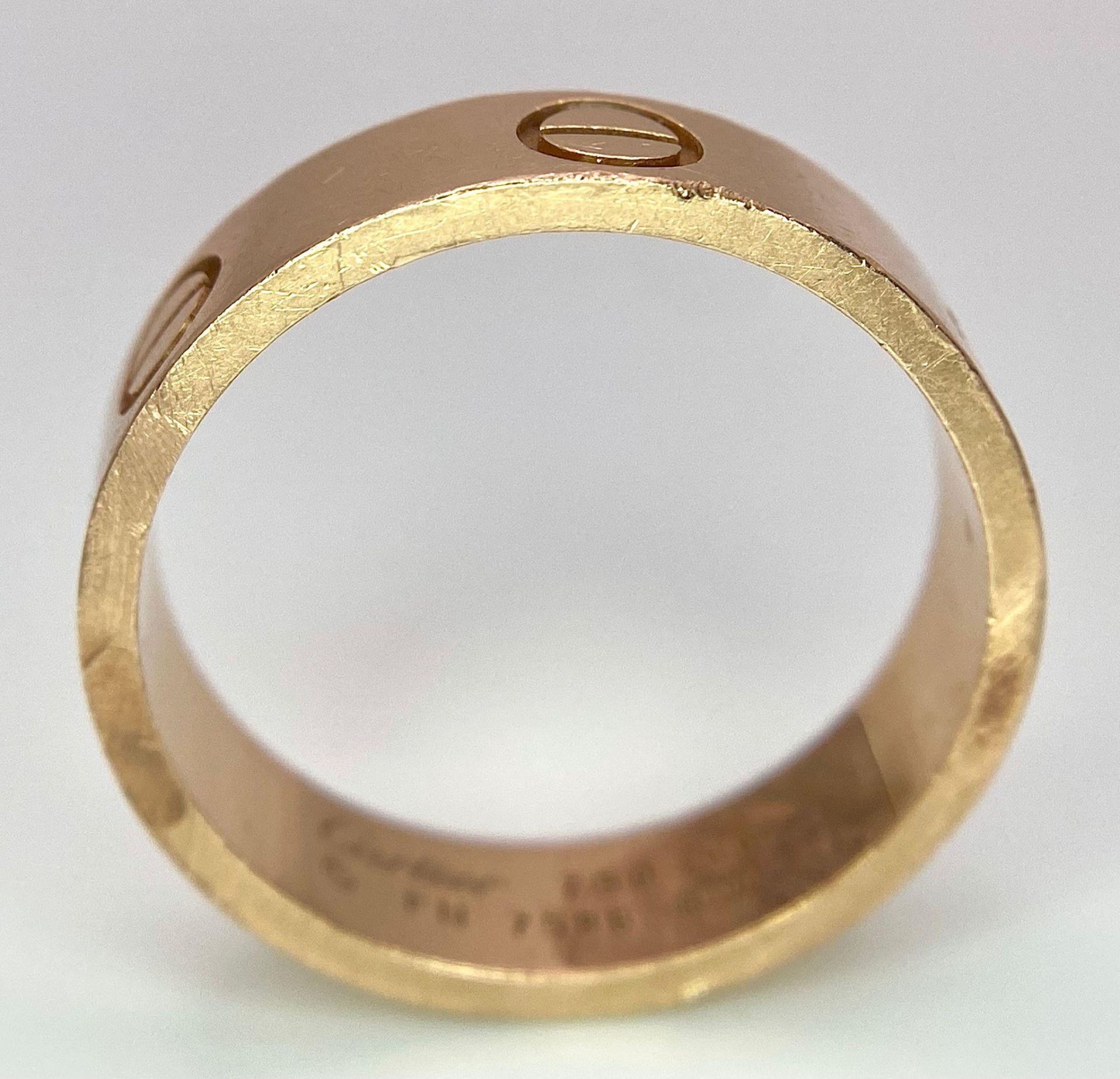 A Cartier 18K Rose Gold Love Band Gents Ring. 6mm width. Cartier hallmarks. Size W. 8.6g weight. - Image 6 of 9