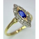 An 18K Yellow Gold Diamond and Sapphire Marquise Shaped Ring. Size M. 2.2g