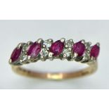 A 9K GOLD RUBY AND DIAMOND RING . 2.3gms size M